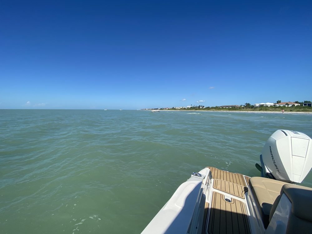 View from the stern of the boat underway along the Cape Coral waterfront